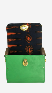green backpack, Satchel, Clutch,Fanny pack, Cross-body bag) easy changing position, Inspired by Spanish and African Culture SPECS Outer: 100% Spanish Cattle leather Lining: 100% Wax African Print fabric Sides: 100% Pine Wood hand Painted One compartment Vintage Click-plated 
